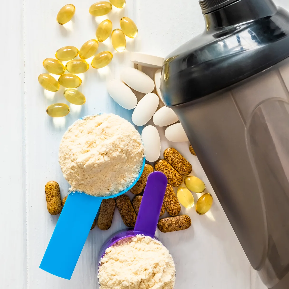 Shaker, protein powder and capsules for sports nutrition